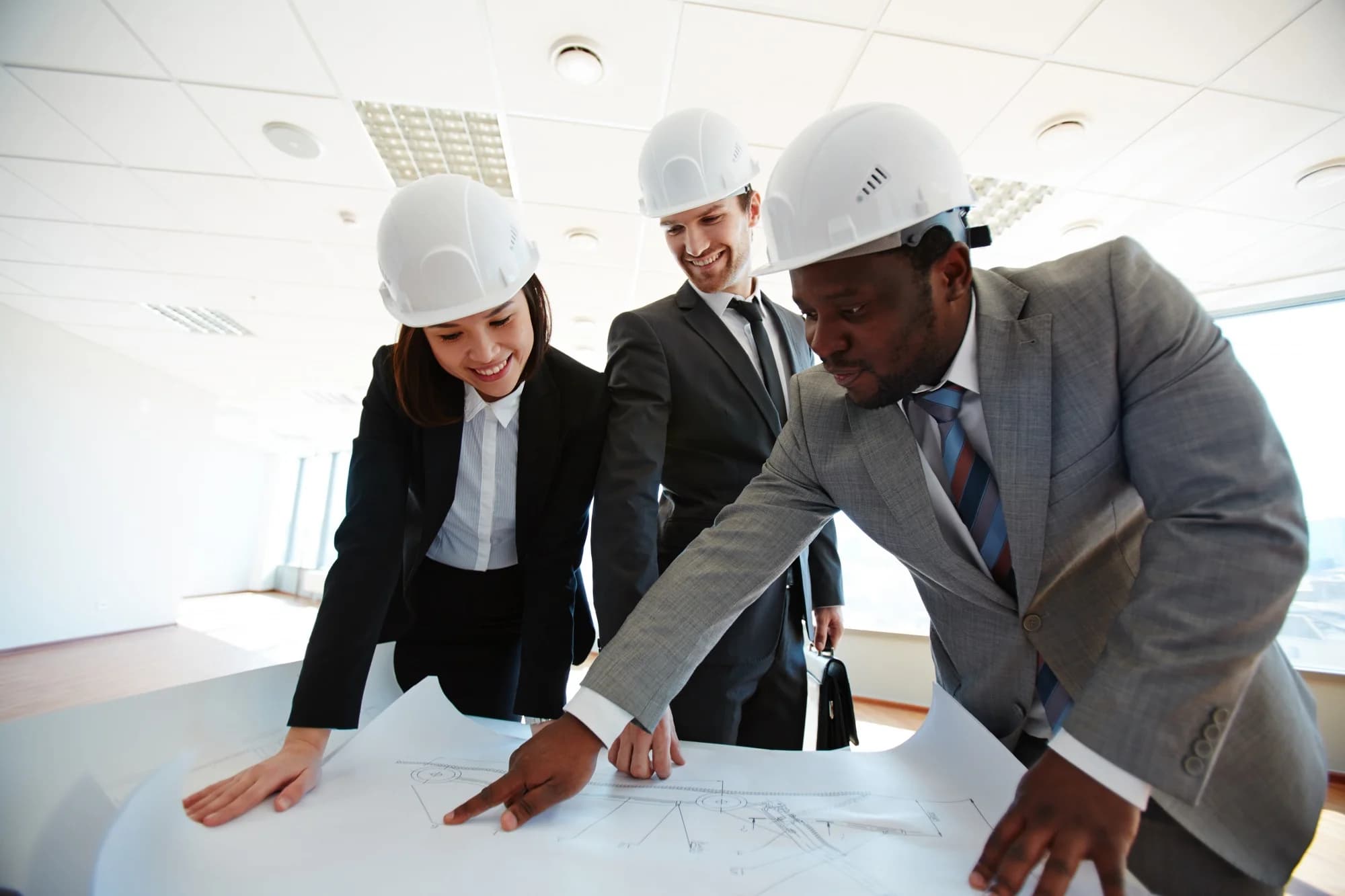 Architects analyzing a blueprint.