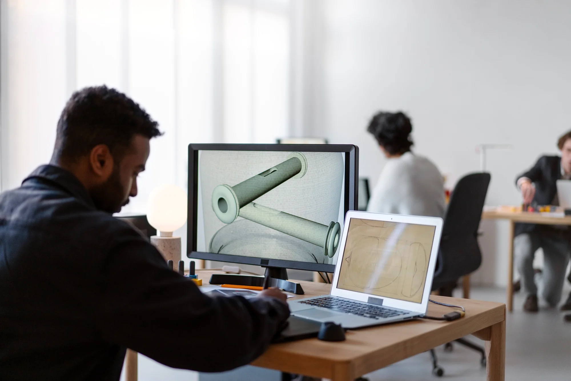 BIM Professional working on a 3D model in the office.