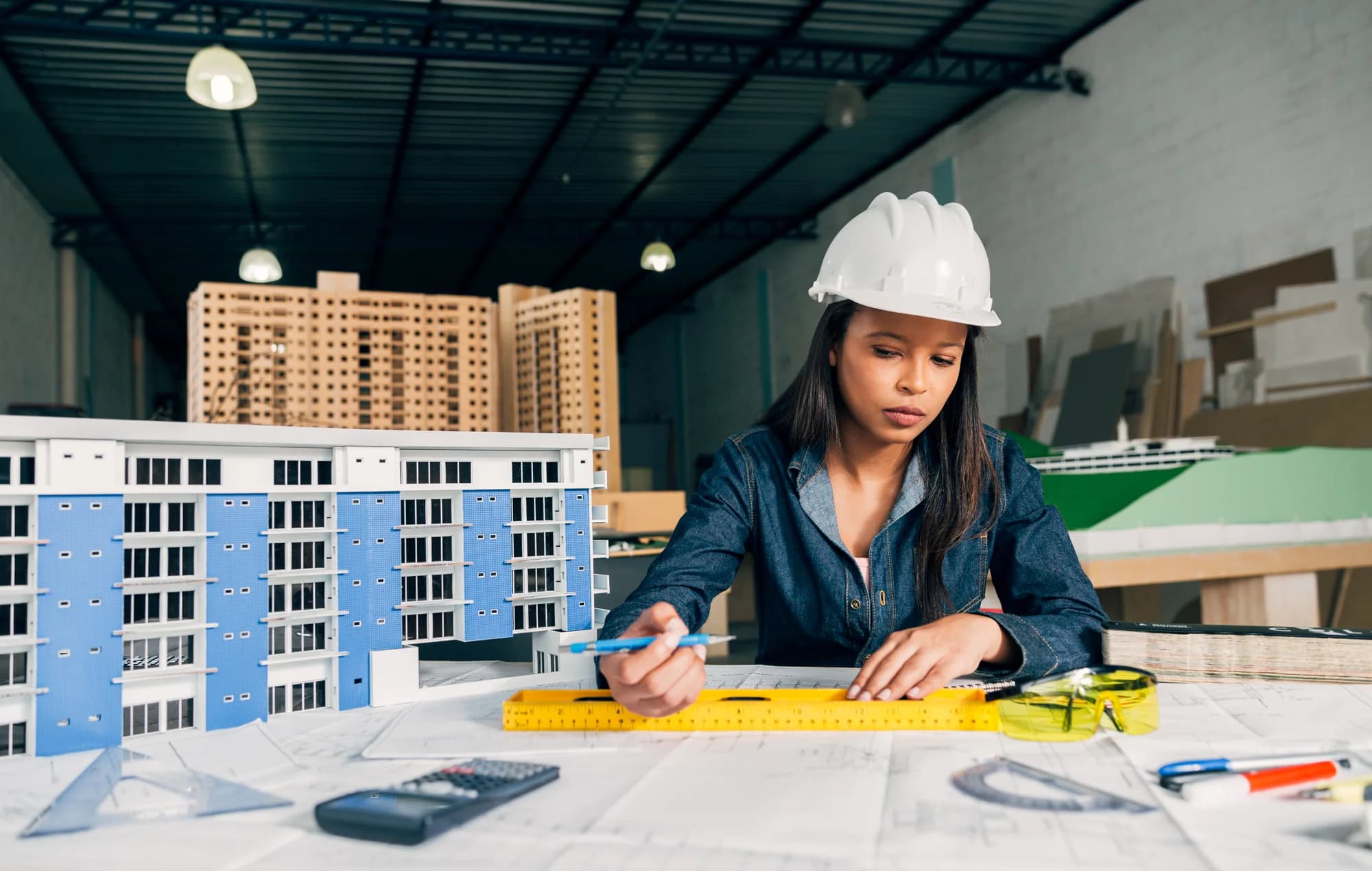 Civil engineer working on blueprints.